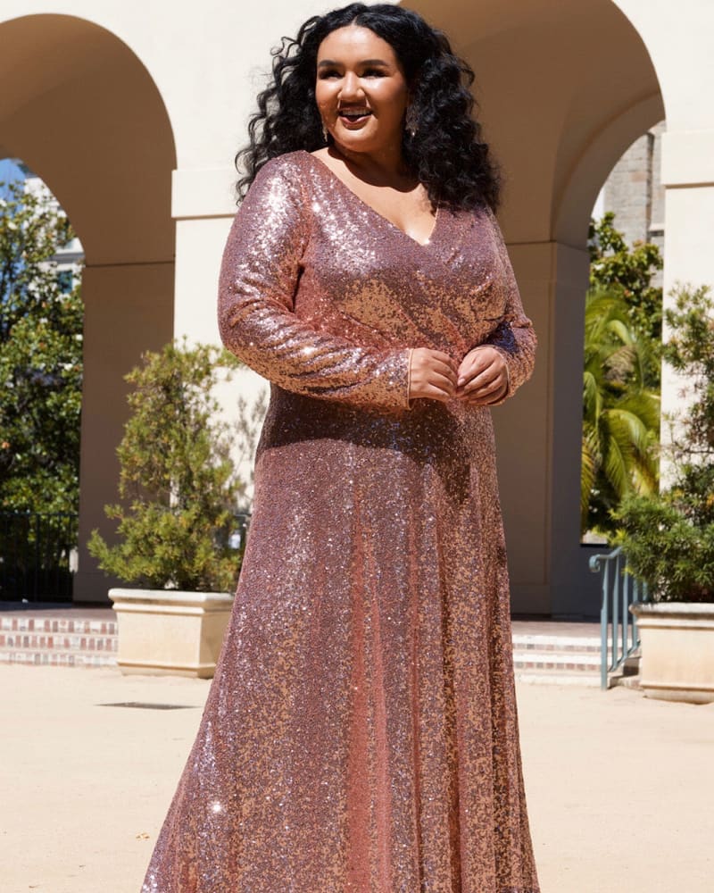 Front of a model wearing a size 26 Uptown Evening Dress in Rose Gold by Celebrations by Sydney's Closet. | dia_product_style_image_id:250993